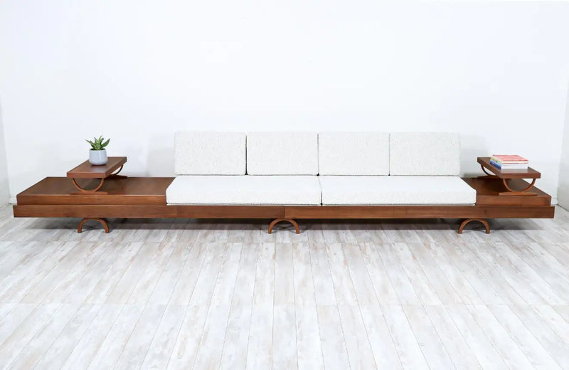 Modern Indian living room with warm-toned sofa and wooden furniture reflecting 2026 design trends