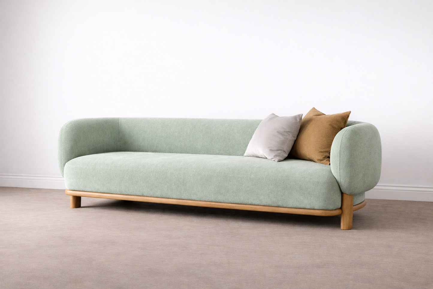 Light green sofa with wooden legs and two cushions